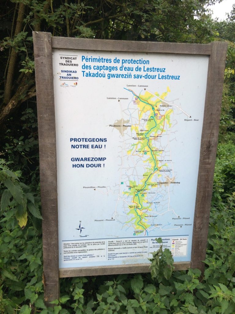 Signpost at Trou Ar Ru urging people to take care of the watershed.