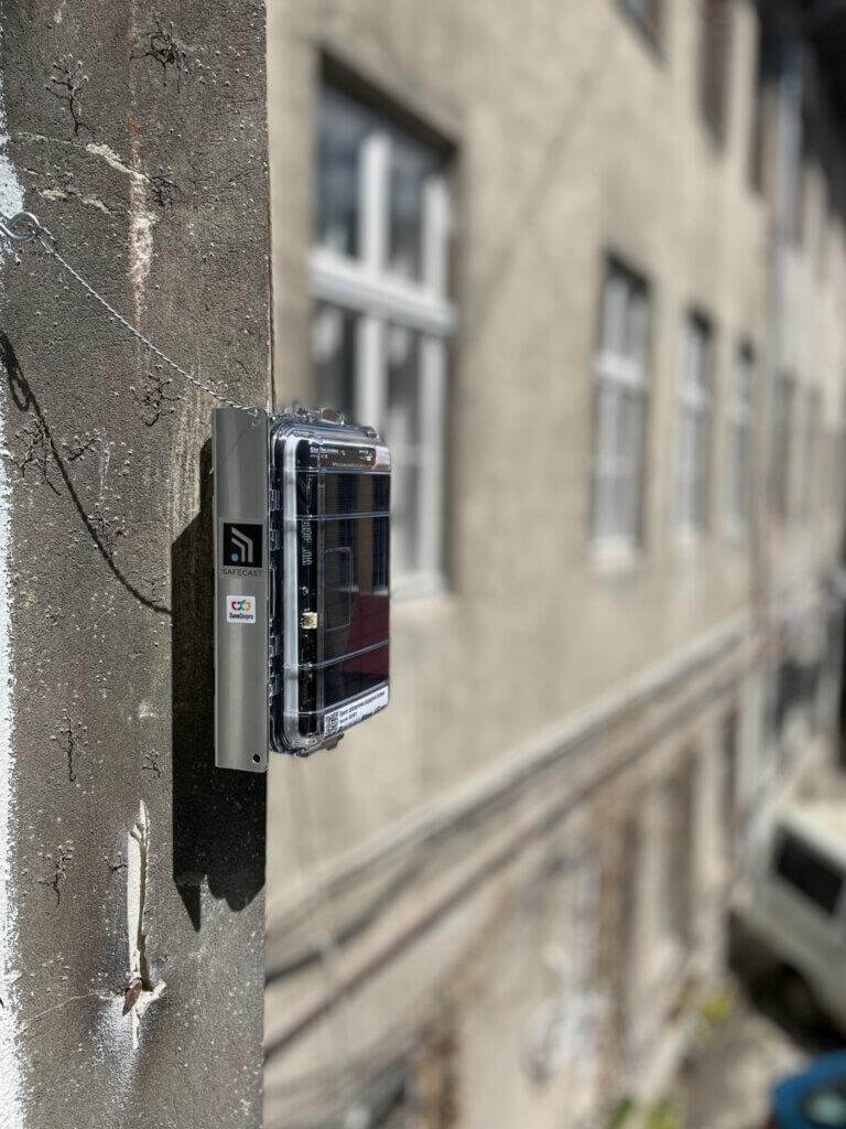 A Radnote realtime radiation detector installed on a sunny wall in Lviv, Ukraine, May 10, 2024