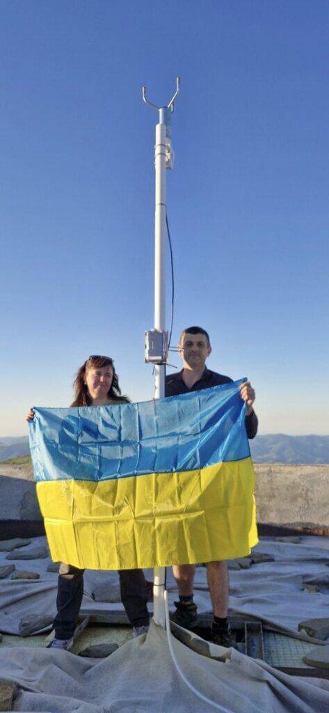 Researchers from Carpathian National University celebrate the successful installation of their Radnote wireless realtime radiation sensor atop Mt. Pip Ivan in western Ukraine