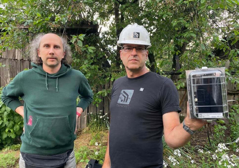 Above: SaveDnipro Technical Director Pavlo Tkachenko (left) and Safecast Lead Engineer Joe Moross prepare a RADNOTE sensor for the first installation in Kyiv, Ukraine, May 2024© Azby Brown / Safecast