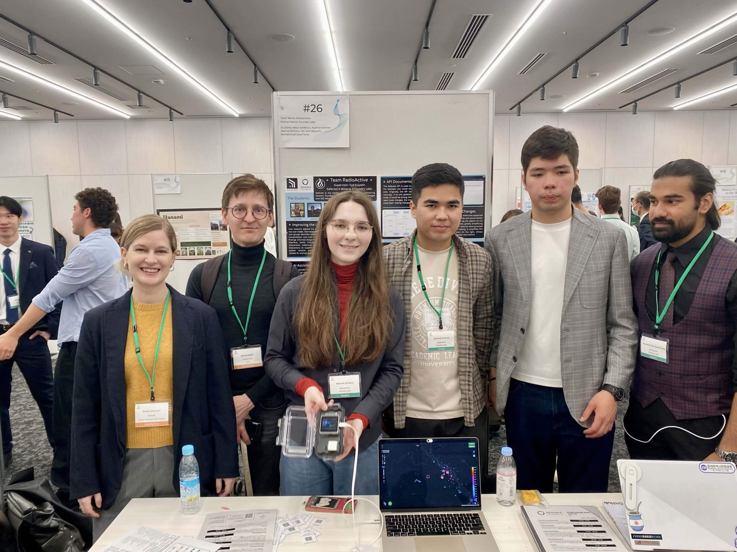 Students presenting their work at the Minerva University: Tokyo Symposium 2026 with Kelsie Stewart (Safecast Education and Outreach Director) and Ilya Kulyatin (Project Mentor from Foundry Labs) April 17, 2026.
